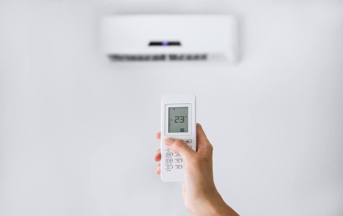 Split air conditioner on a white wall.