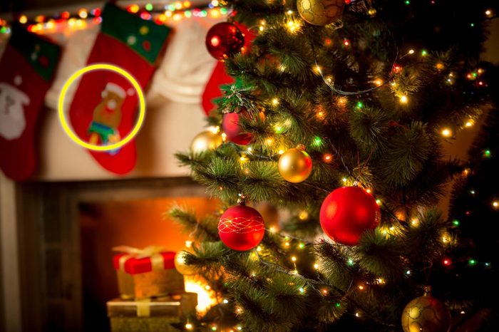 Beautiful decorated fireplace and Christmas tree at cottage