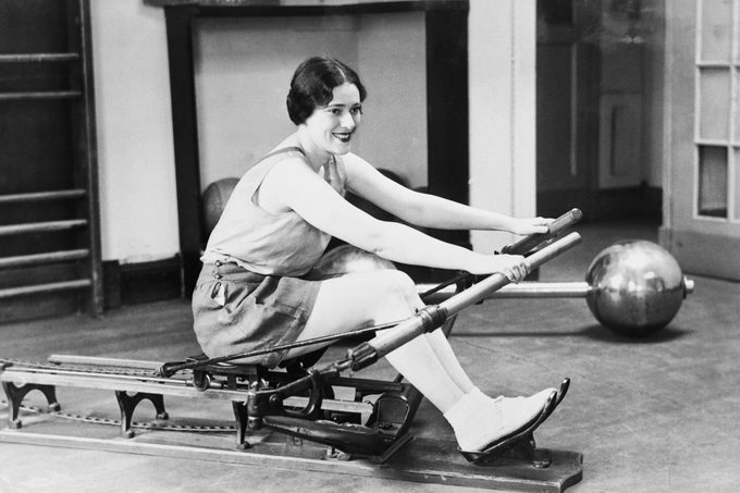 Woman using rowing machine