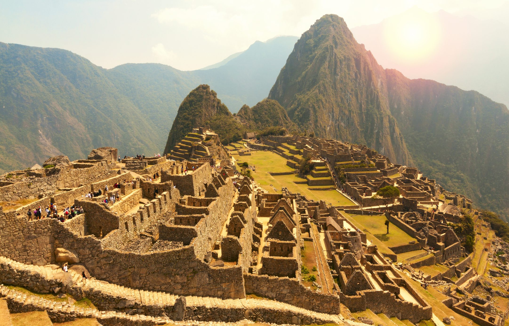 Machu Picchu, Cusco region, Peru: Overview of agriculture terraces, Wayna Picchu and surrounding mountains in the background, UNESCO, World Heritage Site. One of the New Seven Wonders of the World