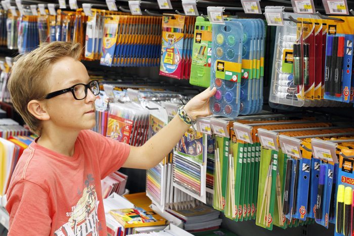 Child Getting School Supplies