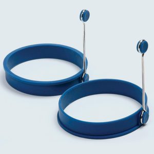 Two blue silicone rings with metal handles lie adjacent on a plain, light background.