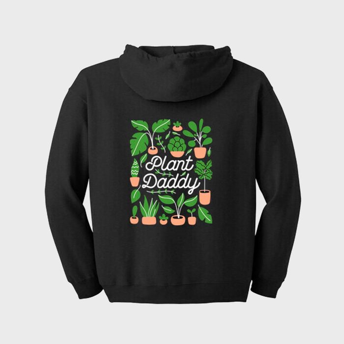 Hoodie displays potted plant illustrations surrounding the phrase 