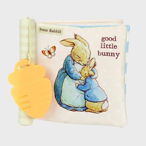 Cloth book features rabbits embracing, with 