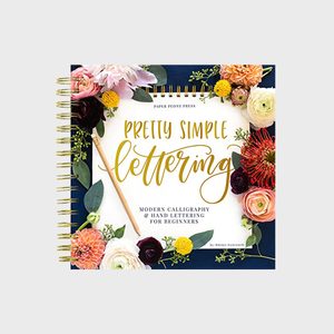 Book cover displays gold lettering on a floral background, with the text 
