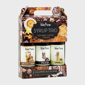 Three coffee syrup bottles displayed in packaging, featuring Salted Caramel, Mocha, and Vanilla flavors, surrounded by images of coffee and desserts.
