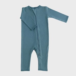 A teal-colored baby romper is laid flat, showcasing a front zipper, against a plain white background.
