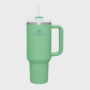 Green travel mug with a straw, featuring a handle and 