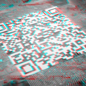 QR code displaying distorted glitch effects overlaid on a circuit board background.