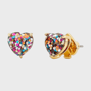 Heart-shaped earrings sparkle with multicolored glitter, set in gold-tone metal on a plain white background.