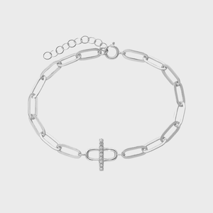 Silver chain bracelet with an elongated link design and a decorative bar. It's placed against a plain white background.