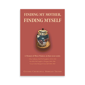 Ceramic jar sits centered; intricate floral design decorates it. Book titled 