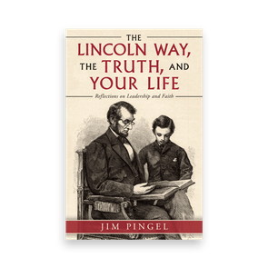 Two men sit reading a book together; the title 