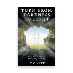 A glowing cross shines through a cave opening, casting light on the rocky interior. Text reads: 