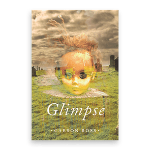 A weathered doll's head appears with windswept hair, set against a cloudy sky and grassy field. Text: 