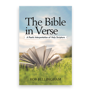 An open book lies on grass, pages fanned, under a blue sky. Text reads: 