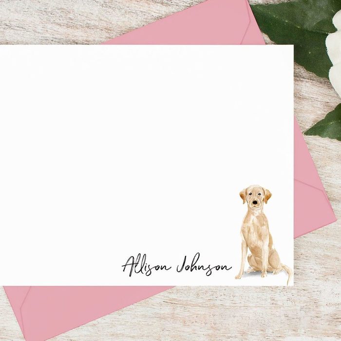 Card displays seated dog illustration, textual name 