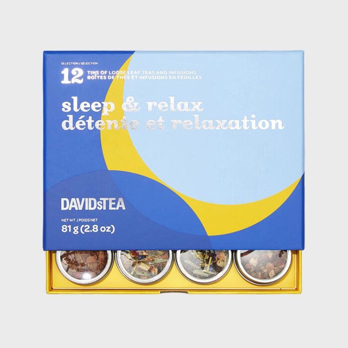 Box contains 12 tins of loose leaf teas, labeled 