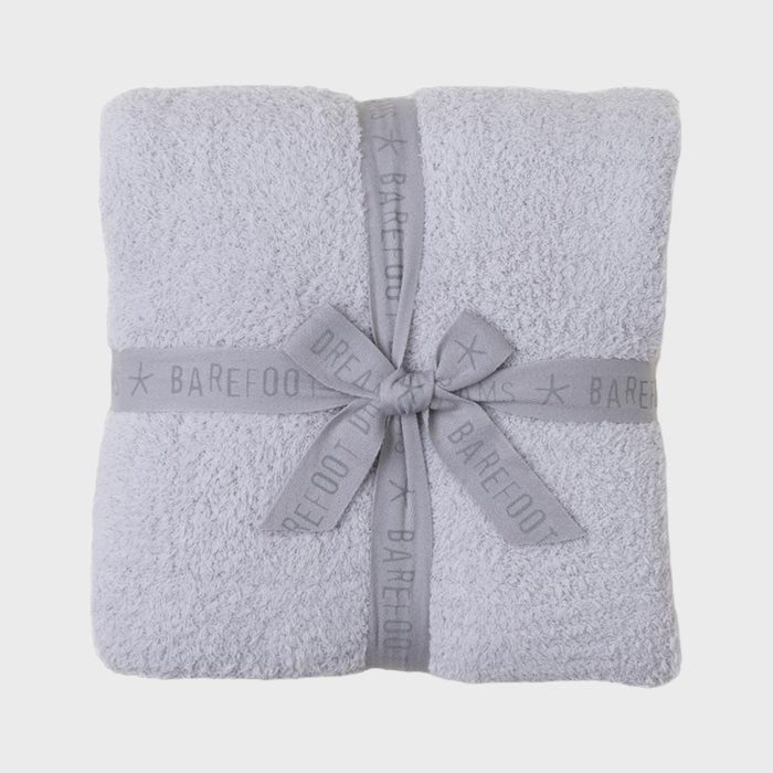 Gray blanket wrapped with a ribbon forming a bow, featuring the text 